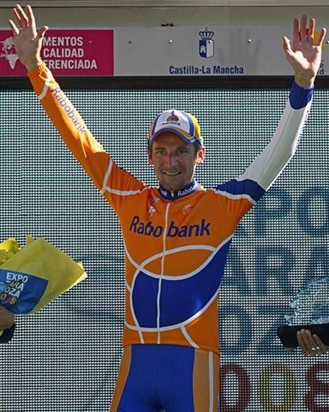 Russian Denis Menchov (Rabobank) celebrates on the podium after winning.