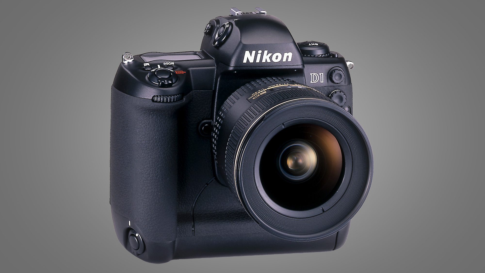 The Nikon D1 camera on a grey background