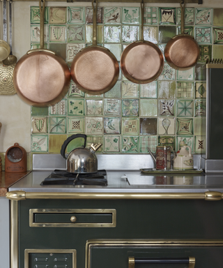 copper pans hangin in kitchen