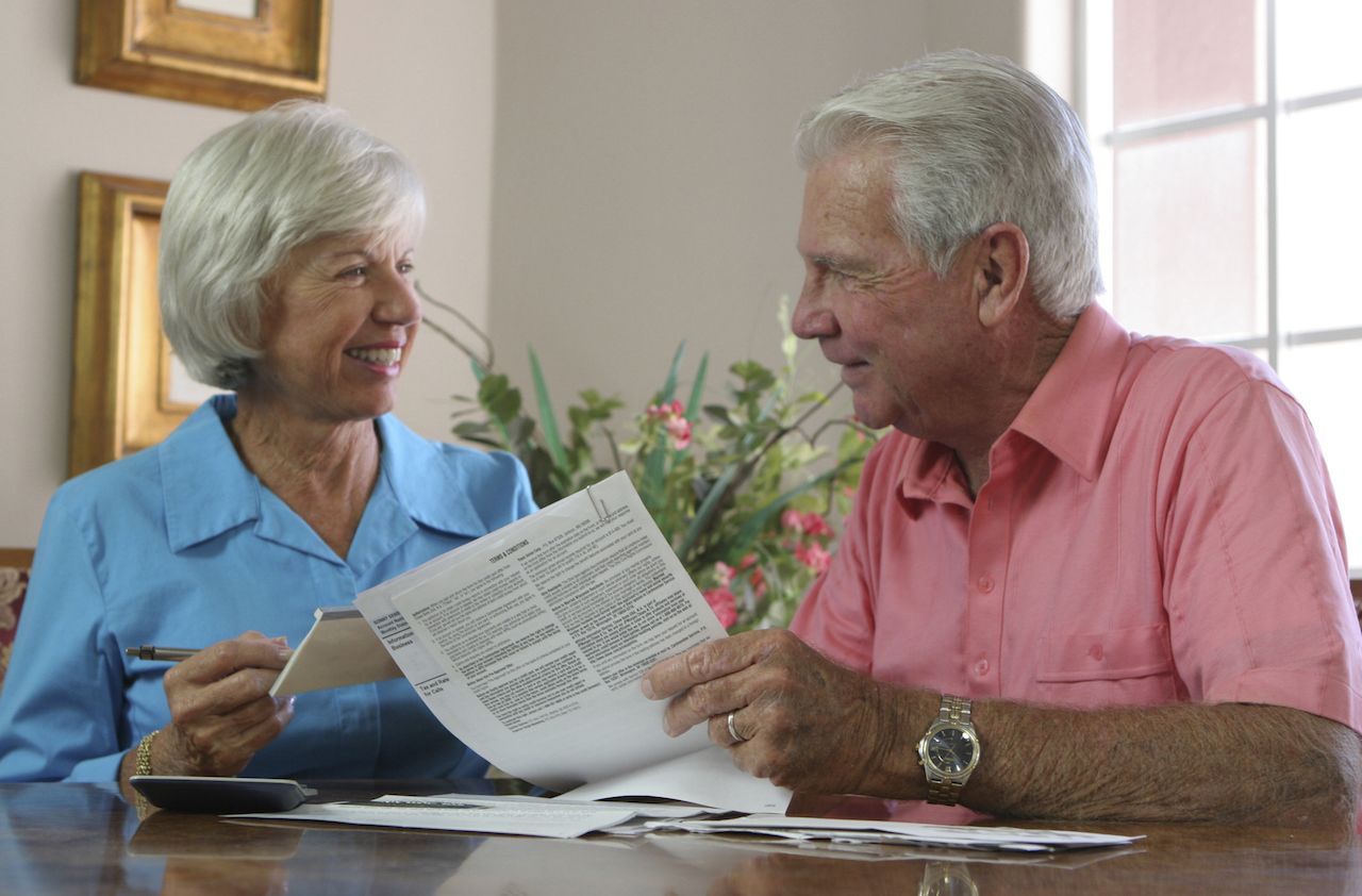 Close-up of a senior couple looking at each other smiling