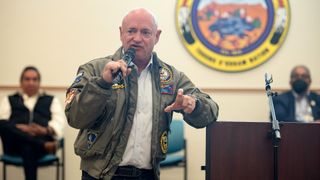 Sen. Mark Kelly (D-AZ) speaks during a Get Out the Vote Rally at San Xavier District Community Center on October 25, 2022.
