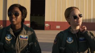 Lashana Lynch and Brie Larson wearing pilot suits in Captain Marvel