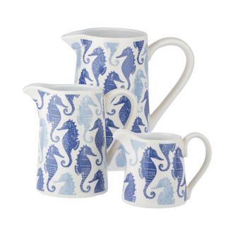 white background with blue printed jugs