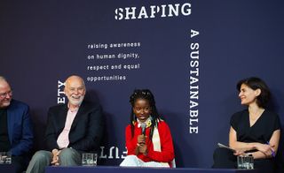 Kent Larson, Richard Armstrong, Amanda Gorman, and Amale Andraos participate in a panel discussion during Prada's ‘Shaping a Sustainable Future Society' conference in New York City