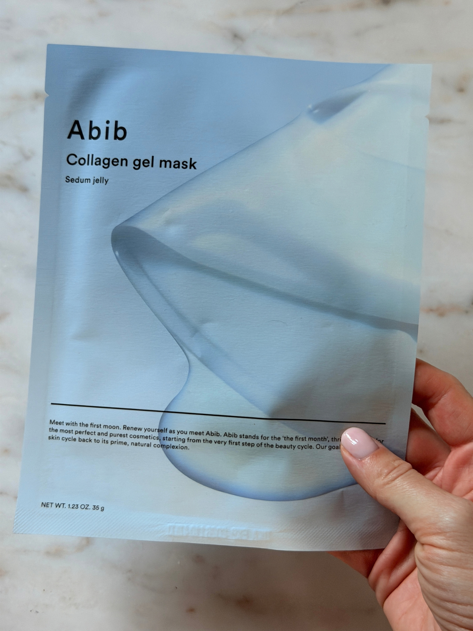 Freelance beauty editor Grace Day holding the Abib face mask