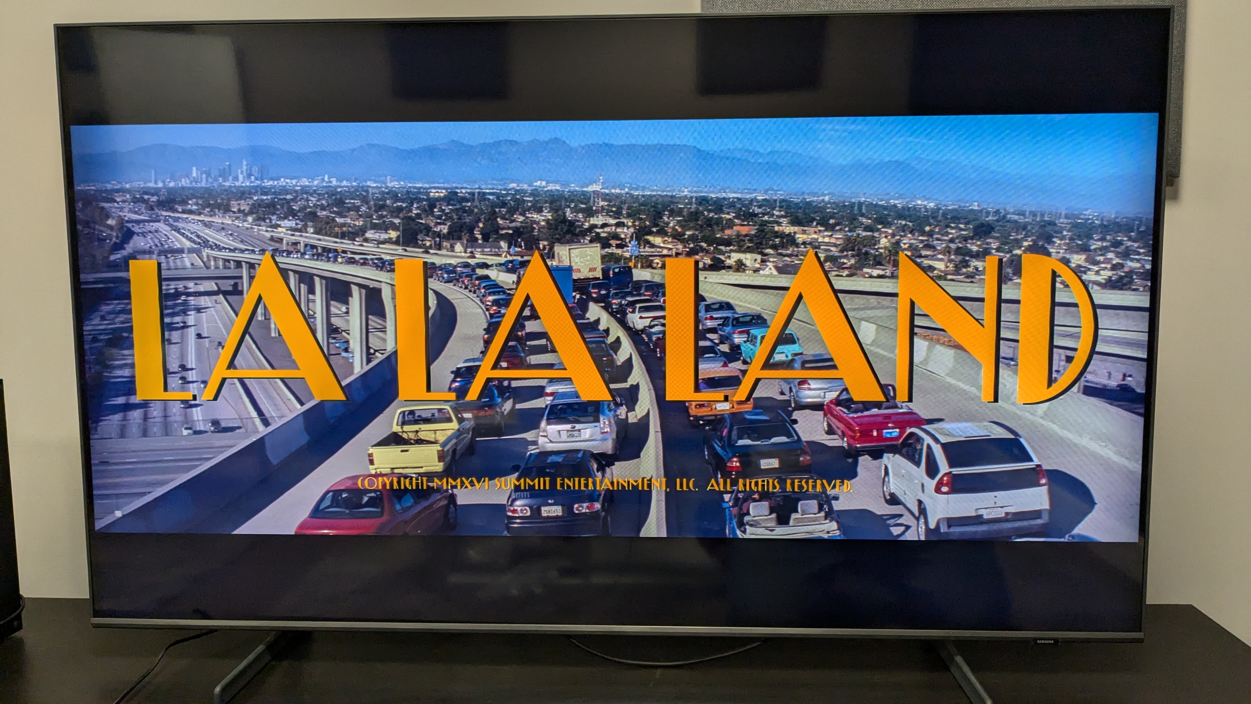 Samsung Q60D with La La Land title card on screen