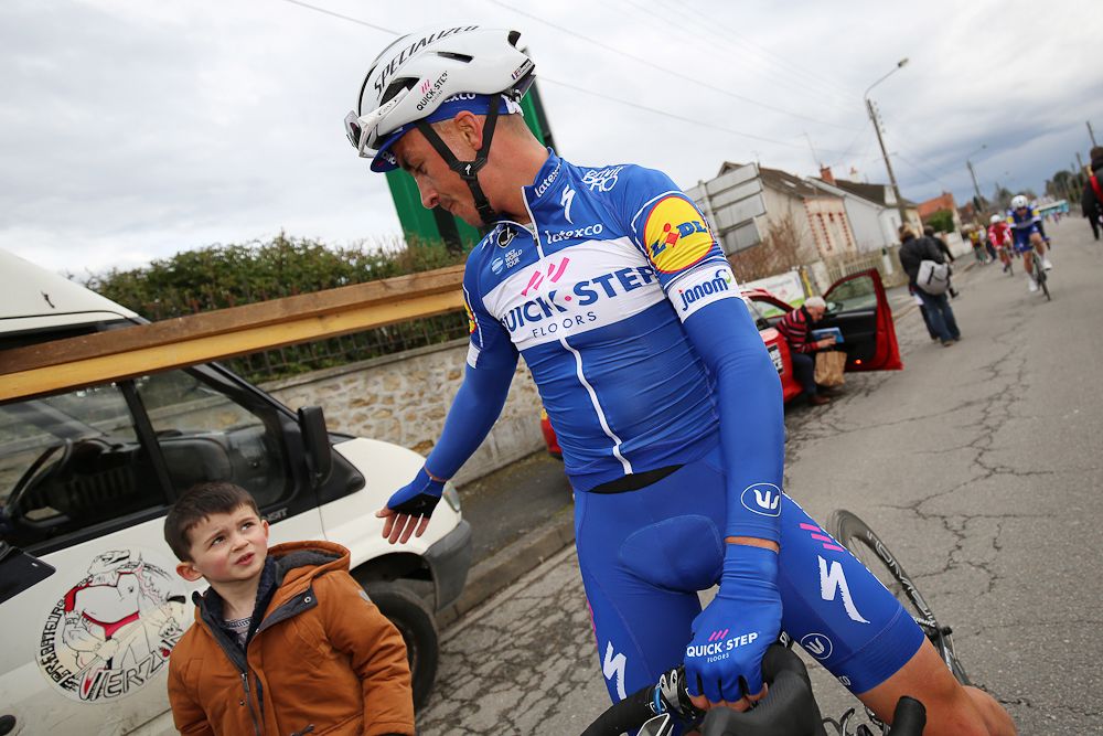 Julian Alaphilippe says hello to a young fan at Paris-Nice