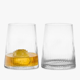 Glass tumblers from John Lewis, one filled with amber liquid