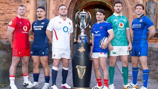 Wales' Dewi Lake, Scotland's captain Sione Tuipulotu, England's Jamie George, France's Antoine Dupont, Ireland's Caelan Doris, and Italy's Michele Lamaro pose with the Six Nations trophy ahead of the 2026 tournament.