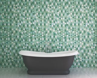 Bathroom with patterned wall panels instead of tiles, and freestanding charcoal bathtub.