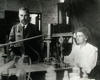 Pierre and Marie Curie in the laboratory, circa 1904.