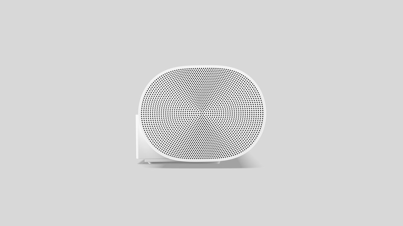 A close up of one end of the Sonos Arc, showing the grille of tiny holes through which the sound from the side-firing drivers emerges