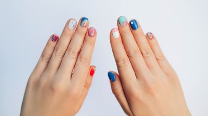 Playful abstract manicure - stock photo