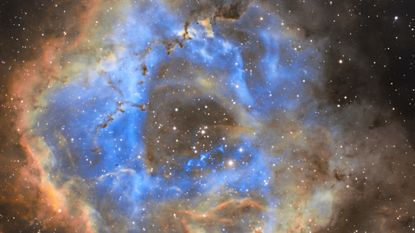 Located approx. 5200LY from Earth in the constellation of Monoceros (next to Orion), the Rosette Nebula is a stunning emission nebula roughly the size of two full moons. This image is a false-color capture using narrowband filters (hydrogen-alpha, ionized sulphur, and doubly-ionized oxygen).