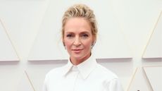 uma thurman in a white shirt on a white background