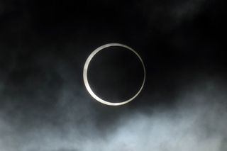 The moon crosses in front of the sun during the annular solar eclipse in Puerto San Julian, Santa Cruz province, Argentina, on October 2, 2024.