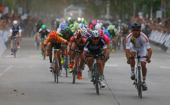 Fernando Gavira (Colombia) and Mark Cavendish (Etixx-Quick Step) cross the line.