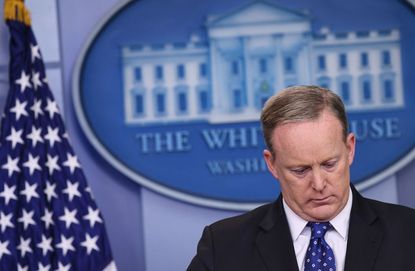 Sean Spicer wasn't hiding in the bushes, exactly