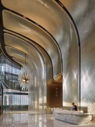 The Henderson, a ZHA tower in Hong Kong with a curved glass facade