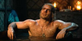 Henry Cavill as Geralt taking a bath in The Witcher