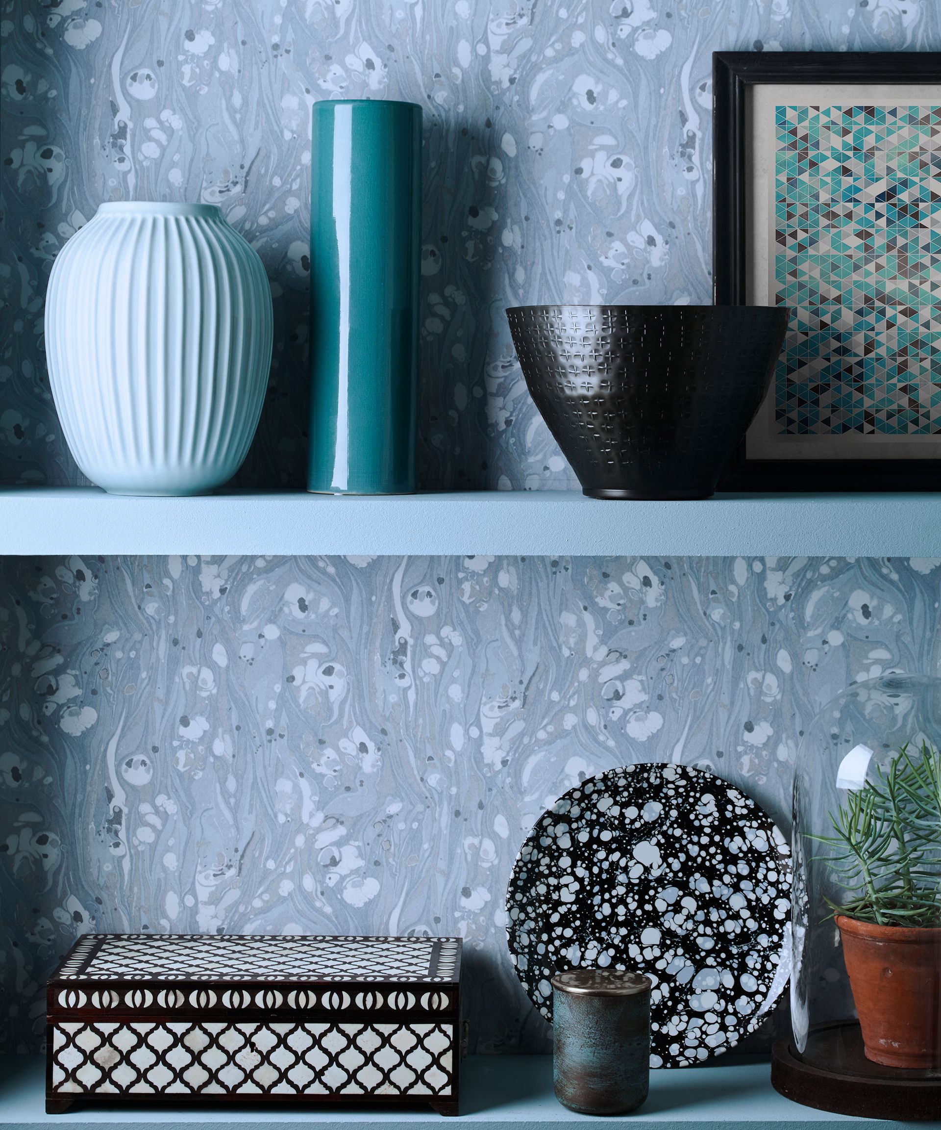 Blue shelves with decorative bowls and plates