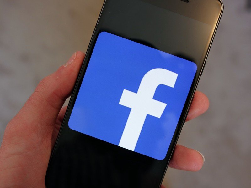 Facebook logo on phone