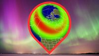 map showing the possible visibility of the northern lights over the US. in the background are vivid green and magenta auroras.