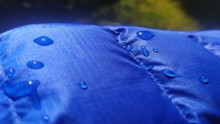 DWR in action: a bead of water on the face fabric of a jacket