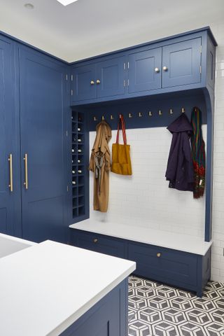 boot room with built in wine storage