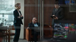 Emily (Phoebe Dynevor), Campbell (Eddie Marsan) and Paul (Rich Sommer) in the office in Fair Play