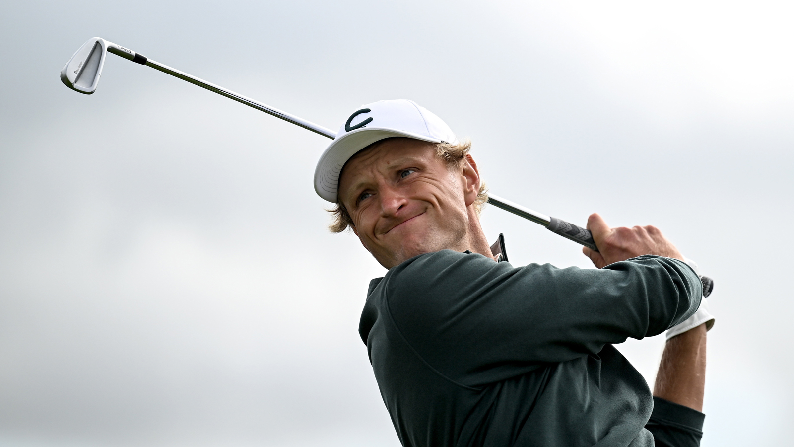 Adrian Meronk hits an iron
