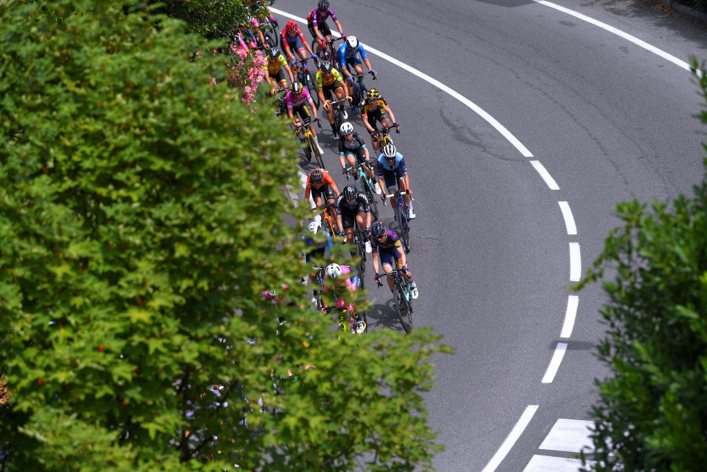 COLICO ITALY JULY 07 Lorena Wiebes of Netherlands and Team DSM Alexis Ryan of United States and Canyon SRAM Racing Team Amanda Spratt of Australia and Team BikeExchange Lucinda Brand of Netherlands and Team Trek Segafredo Marta Bastianelli of Italy and Team Ale Btc Ljubljana The peloton during the 32nd Giro dItalia Internazionale Femminile 2021 Stage 6 a 155km stage from Colico to Colico Landscape GiroDonne UCIWWT on July 07 2021 in Colico Italy Photo by Luc ClaessenGetty Images