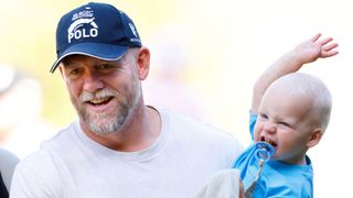 Mike Tindall walking around with son Lucas
