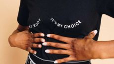 black feminist tee shirt that says "it's my body, it's my choice"