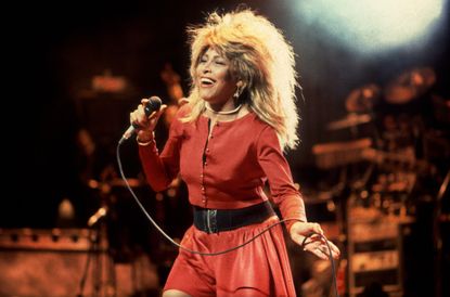 Tina Turner performs on stage in 1987