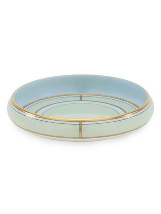 Diva Round Change Porcelain Tray with rounded edges in very light blue with gold deco lines and detailing that makes this tray look Art Deco