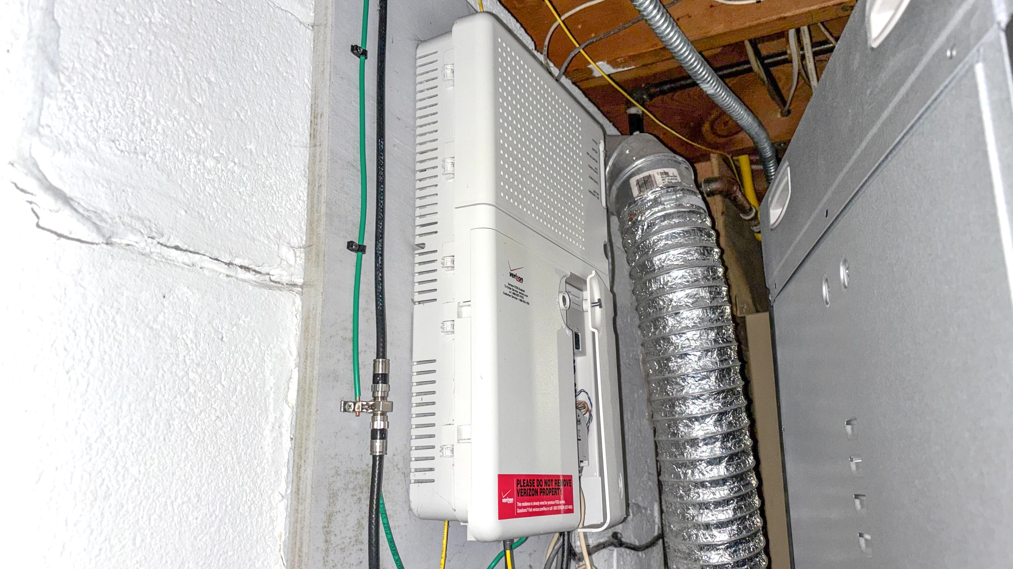 A Verizon Fios ONT box installed inside a home