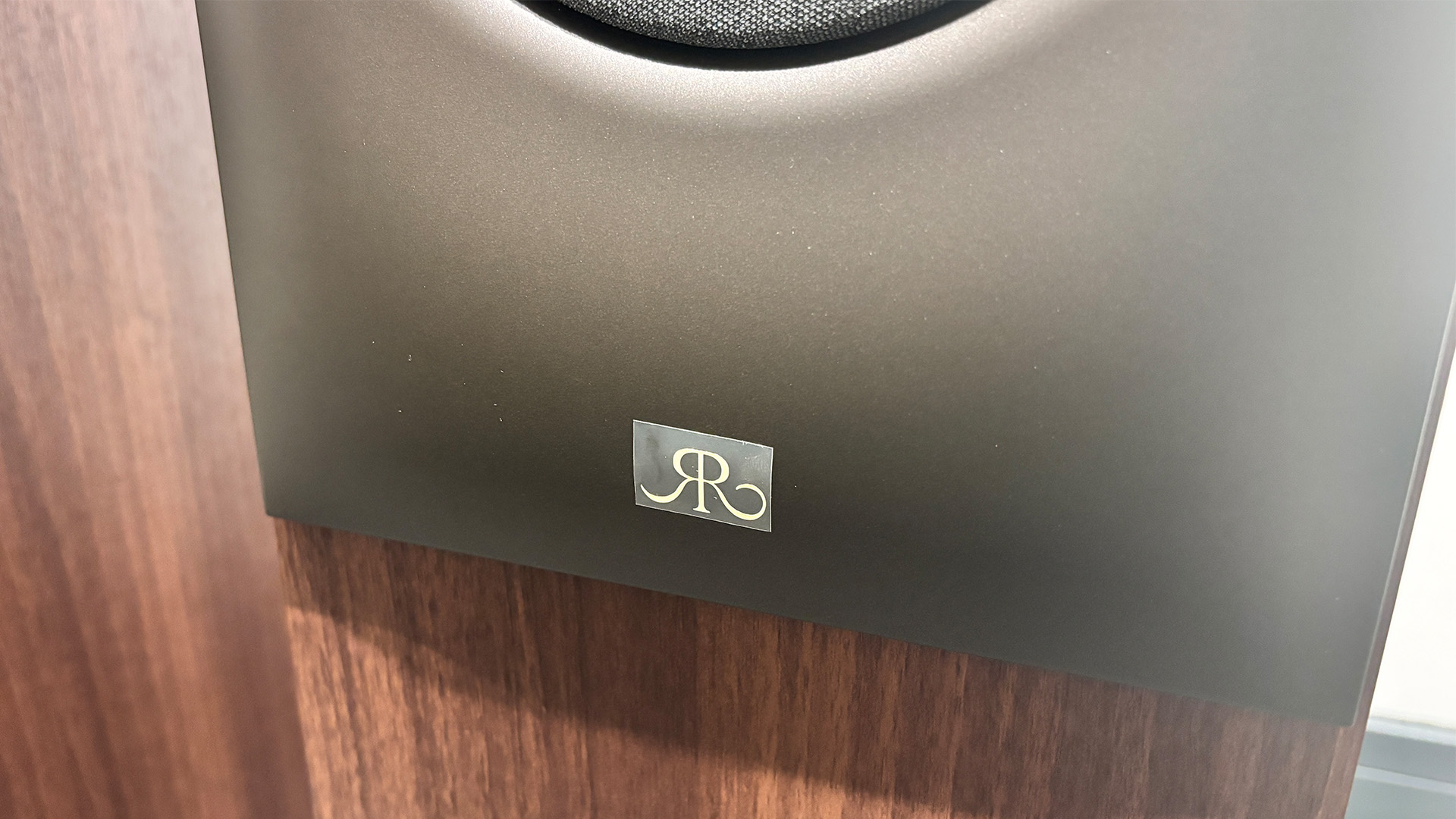 Revival Audio Sprint 4 floorstanding speakers close up on Revival logo