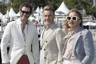 Howard Donald, Gary Barlow, Mark Owen attends the Take That photocall for 'Greatest Days' during the 75th Cannes Film Festival held at the Palais des Festivals in Cannes, France. (Photo credit should read P. Lehman/Future Publishing via Getty Images)