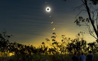 Solar eclipse composite with observers, Mulligan Highway, Queensland, Australia