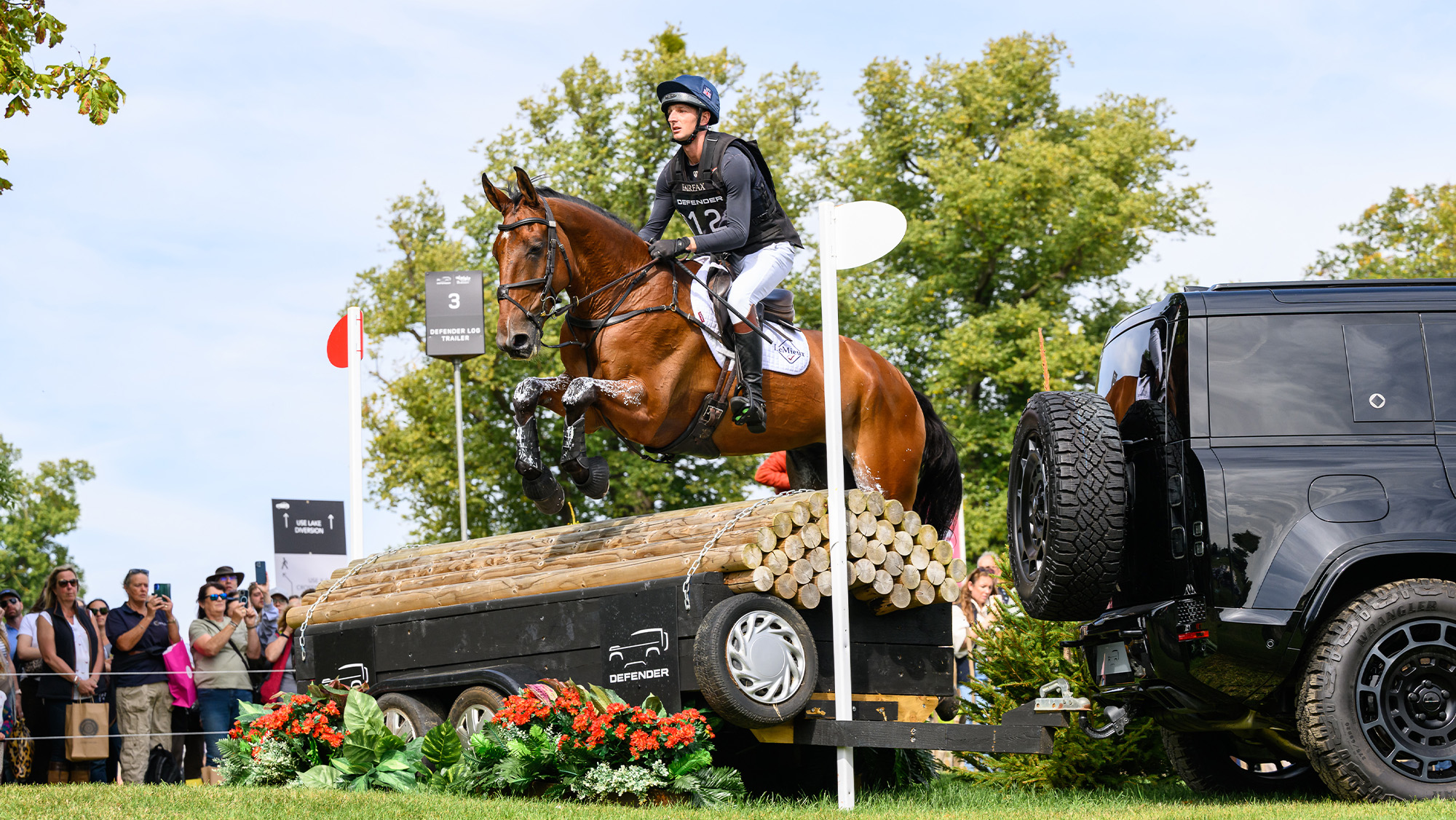 Tom Jackson jumping a cross-country fence on Hawk Eye at Burghley Horse Trials