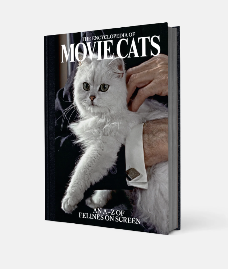 the cover of the encyclopedia of movie cats featuring a white cat in the arms of an elderly man