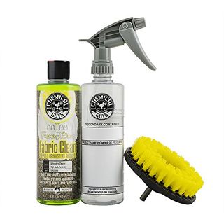 Two bottles of foaming couch cleaner with a drill head brish on white background