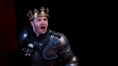 Arthur Hughes as Richard III on stage