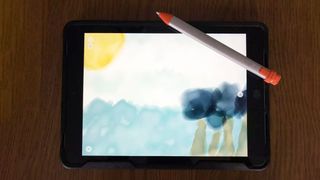 Logitech Crayon being used on an iPad.