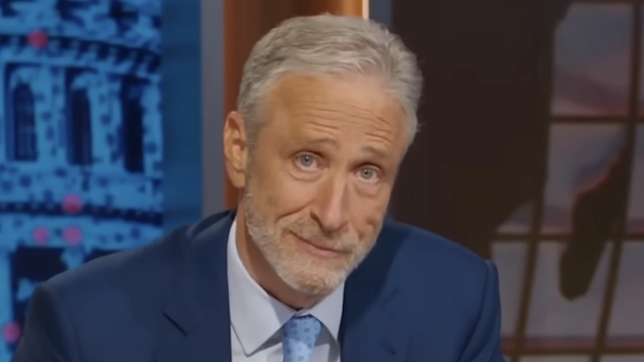 Jon Stewart looking into the camera on The Daily Show