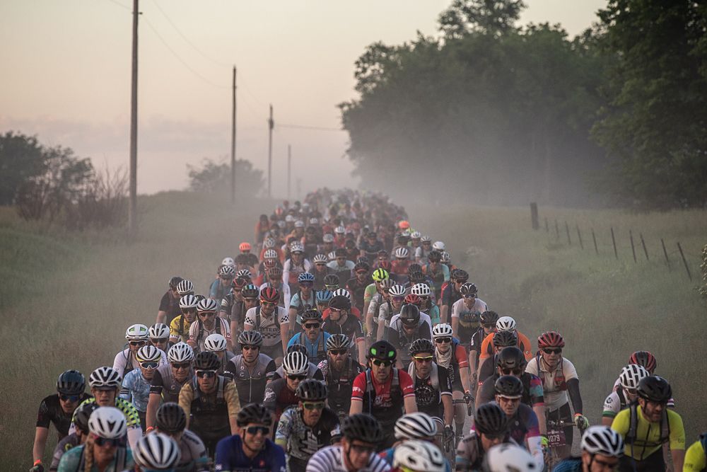 Early miles of the 200-mile event saw the gravel roads packed with riders.