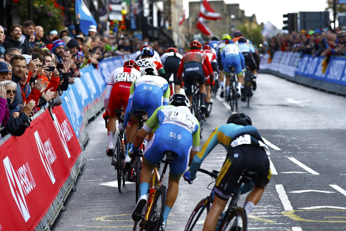 The peloton passes through the start/finish