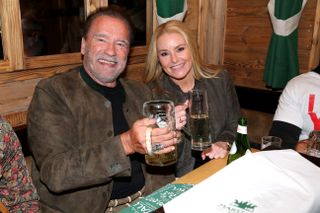 Arnold Schwarzenegger and Heather Milligan at Oktoberfest