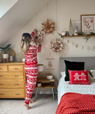 hanging paper bag christmas star decorations in bedroom